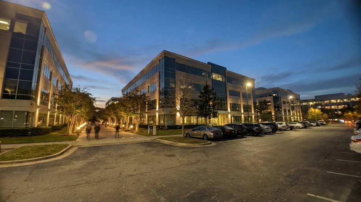 Landscape lighting and security lighting working together on a corporate campus