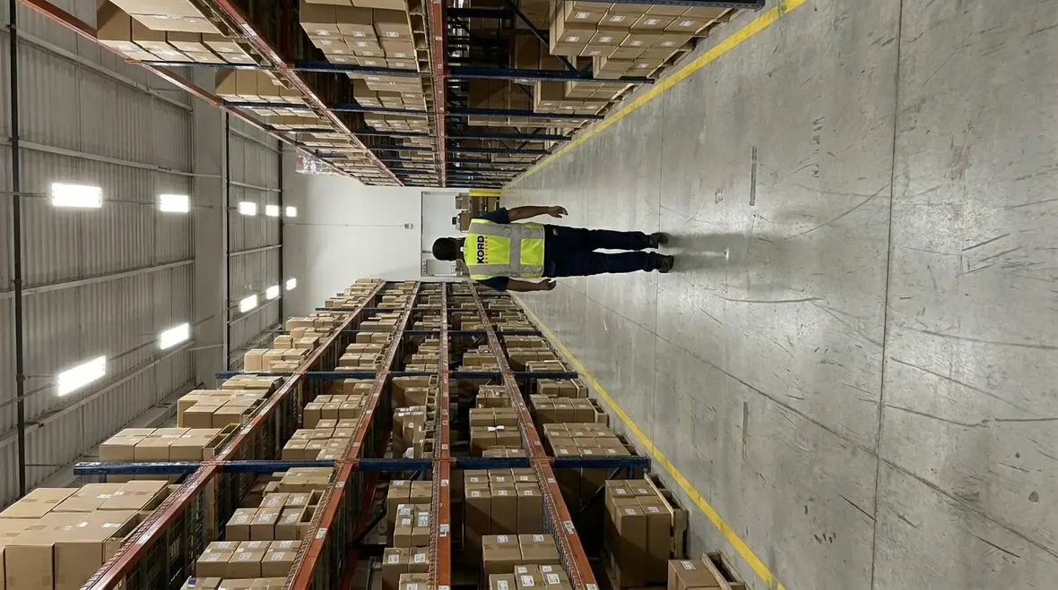 Industrial lighting layout with glare control and surface reflectance management