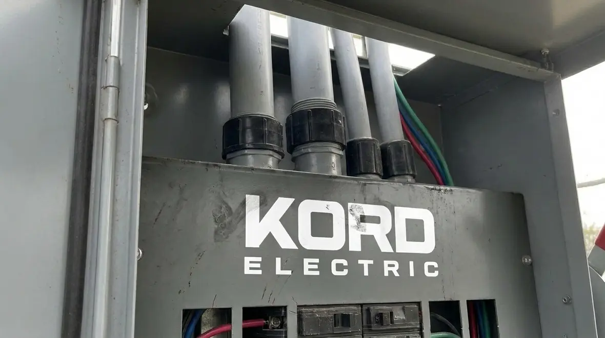 Phased rollout of commercial EV chargers at a large facility