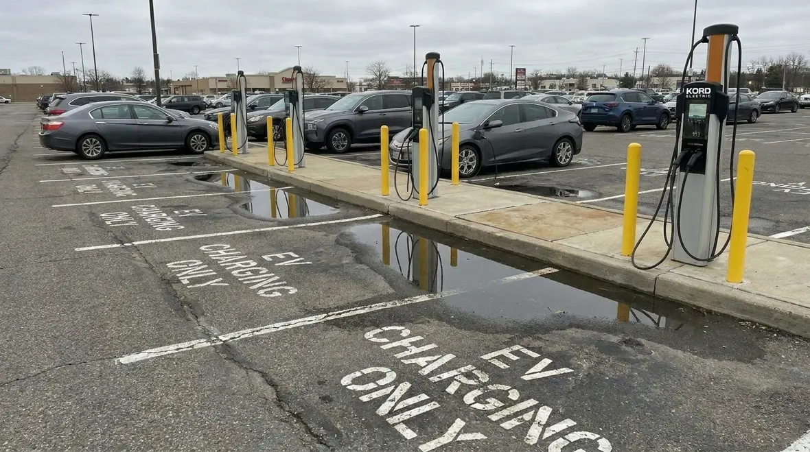 EV charging station layout and access planning for a commercial parking lot