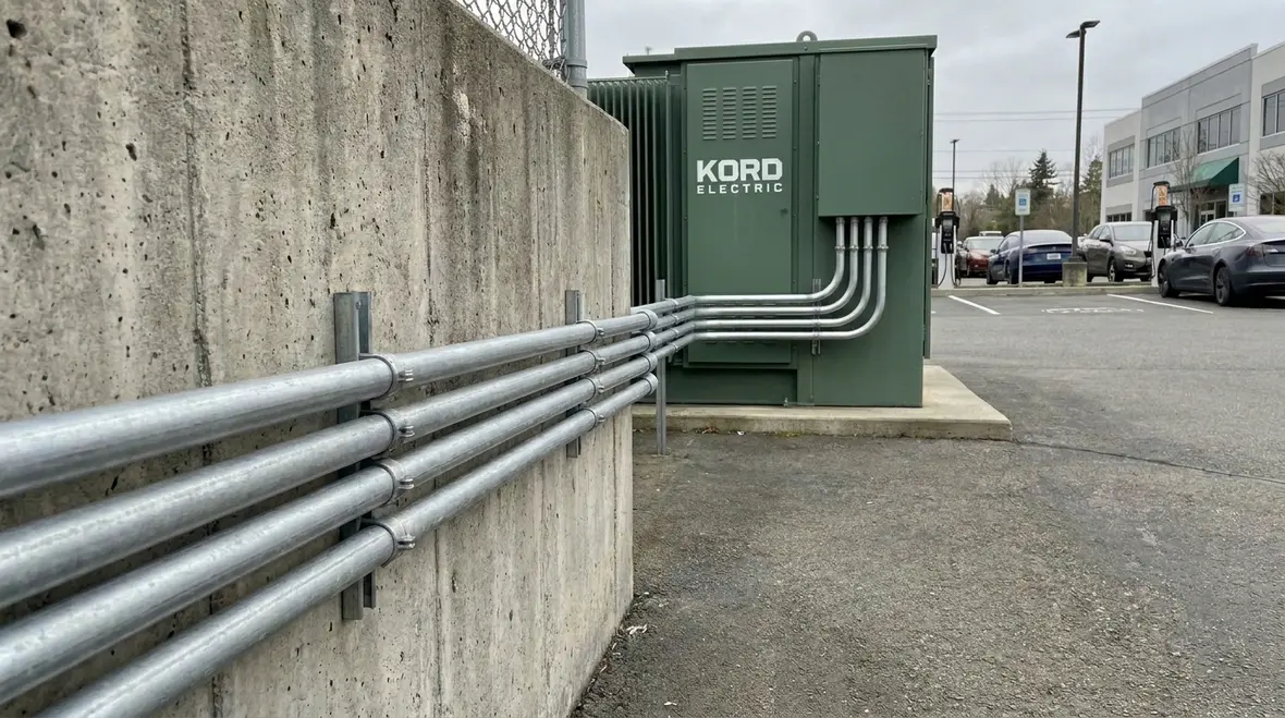 Commercial EV charging stations installed at a modern business park