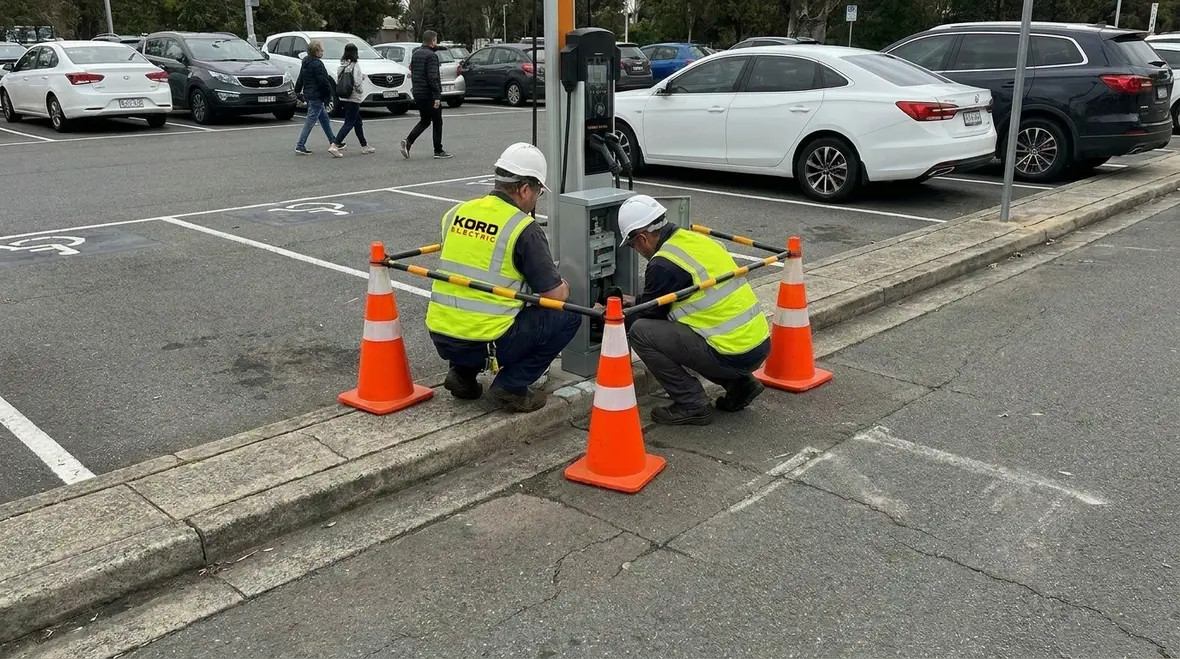 Facility managers reviewing EV power capacity and utility coordination plans
