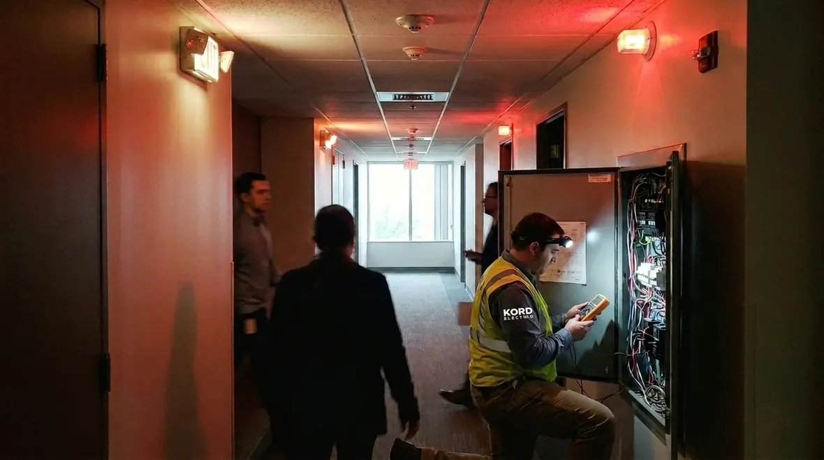 Emergency lighting in a commercial facility corridor