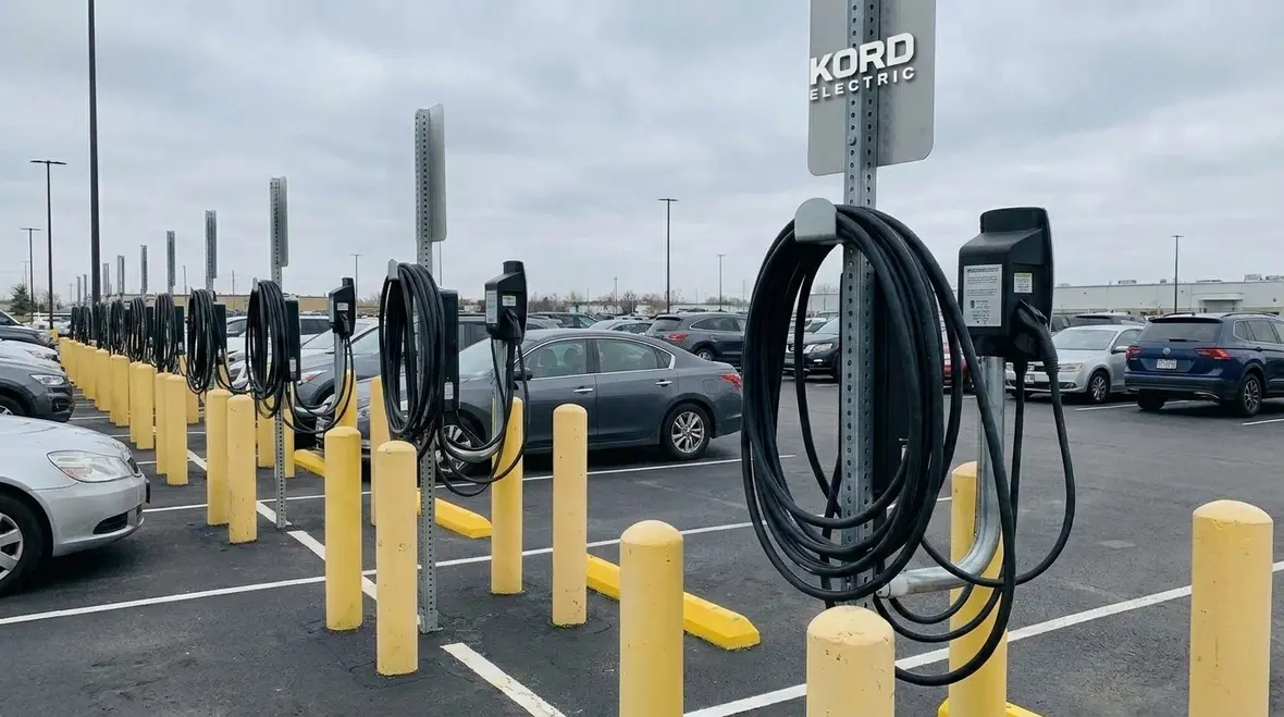 Optimized commercial EV charger layout across a fleet parking area