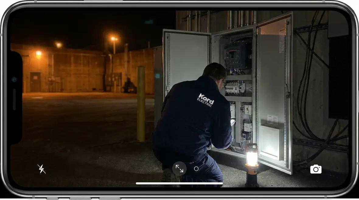 Commercial electrical room with lighting and panels operating reliably