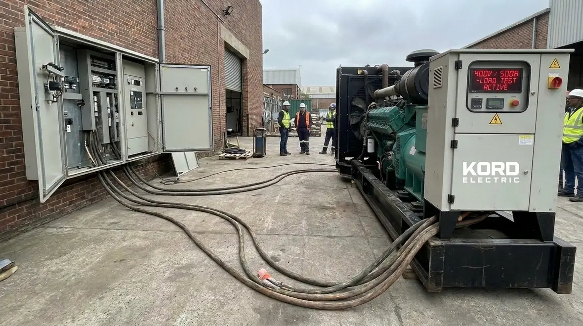 Commercial generator undergoing load testing for emergency readiness
