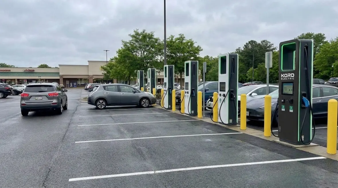 Electrical service and distribution planning for EV charging in a commercial lot