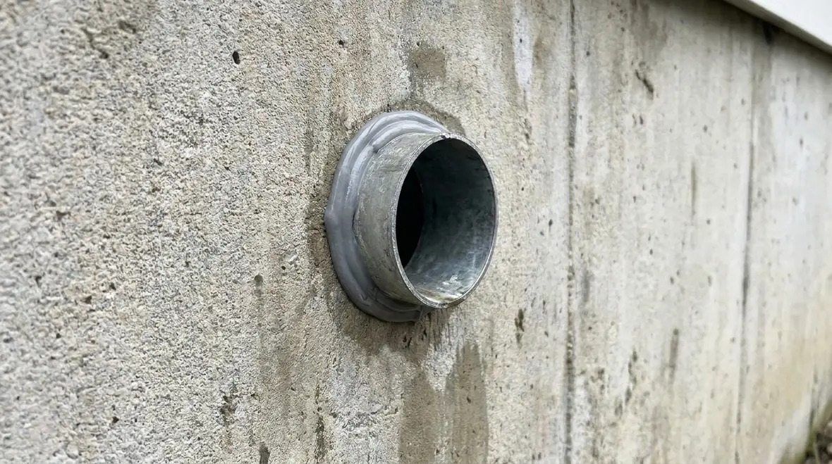 Core drilling and conduit installation for exterior commercial lighting