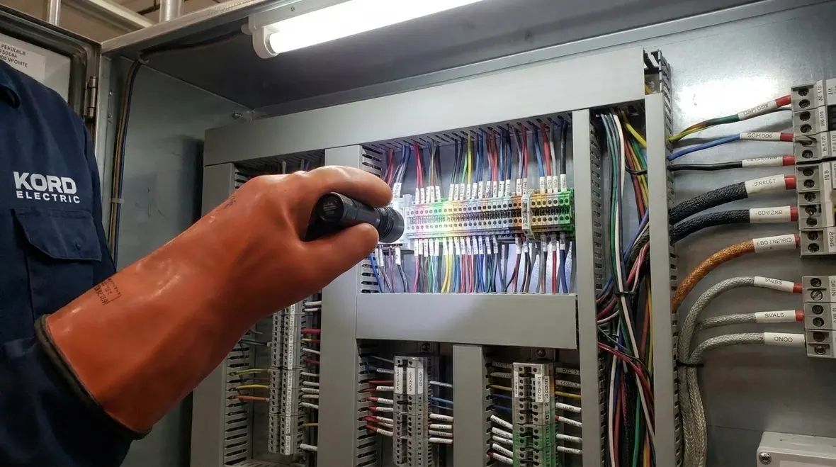 Inspection of panel boards, wiring, and terminations in a major property building