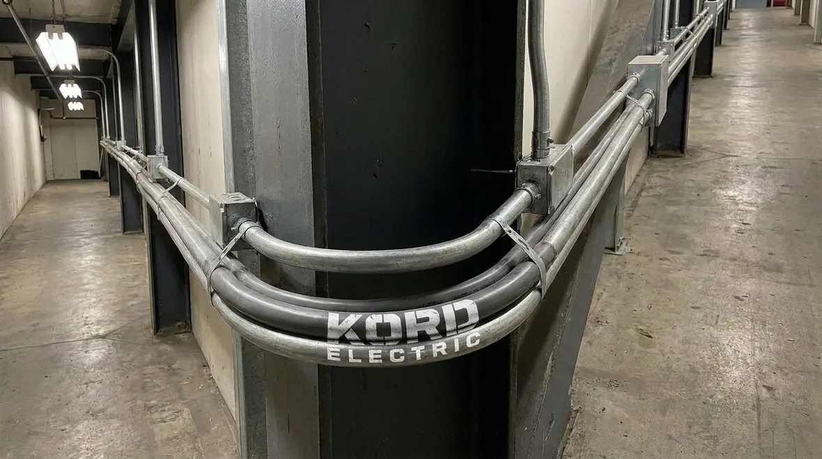Protected UF cable entrances, turns, and terminations in a commercial facility