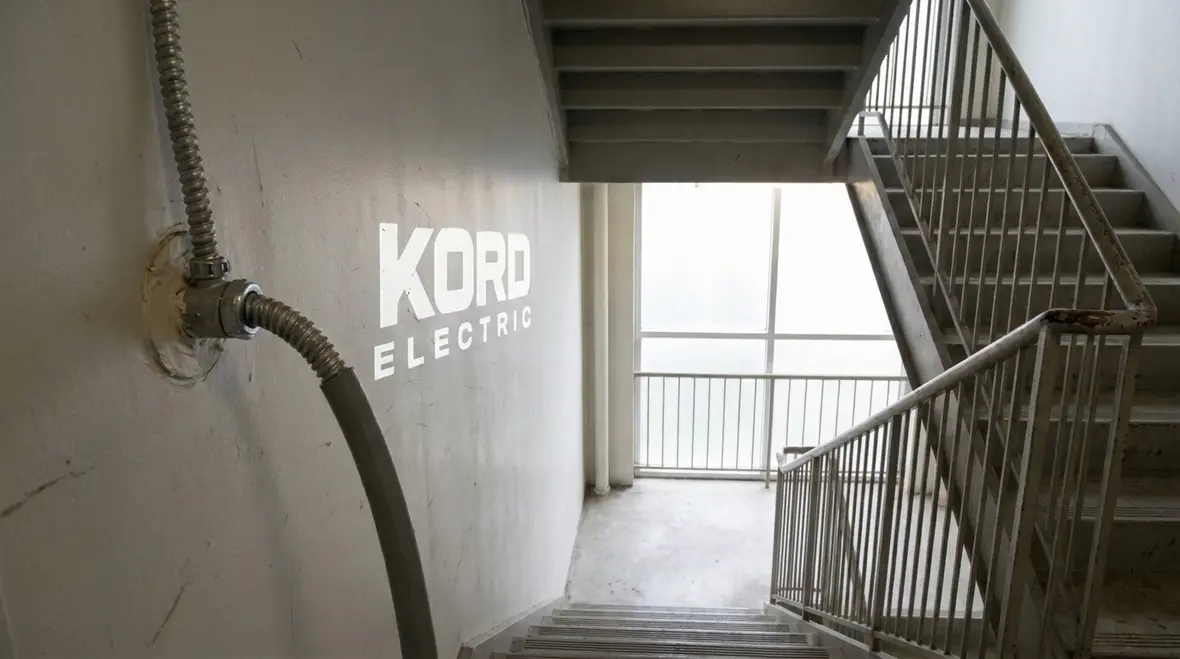 Flexible metal conduit installation under NFPA 70 305.35 in a stair tower