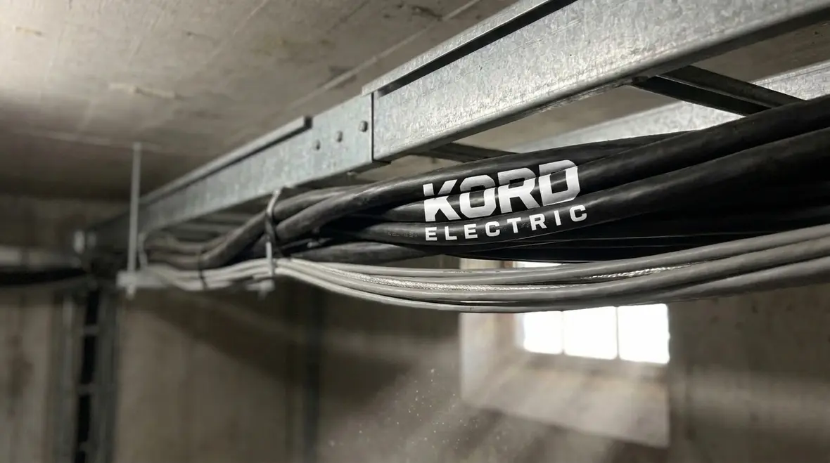 Cable tray showing NEC power conductors installed with other building systems