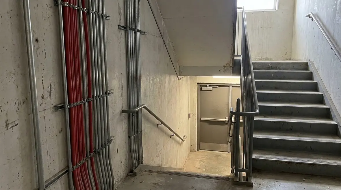 Exit stair tower NEC-compliant wiring installation