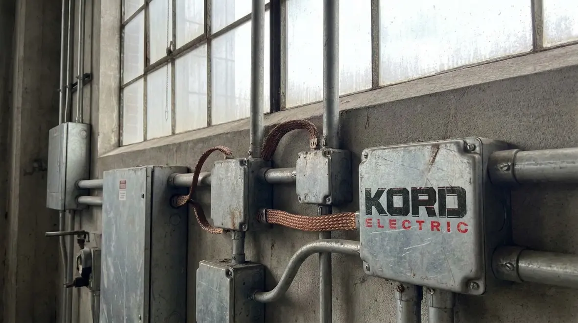 Close-up of bonded metal parts meeting NEC bonding general requirements