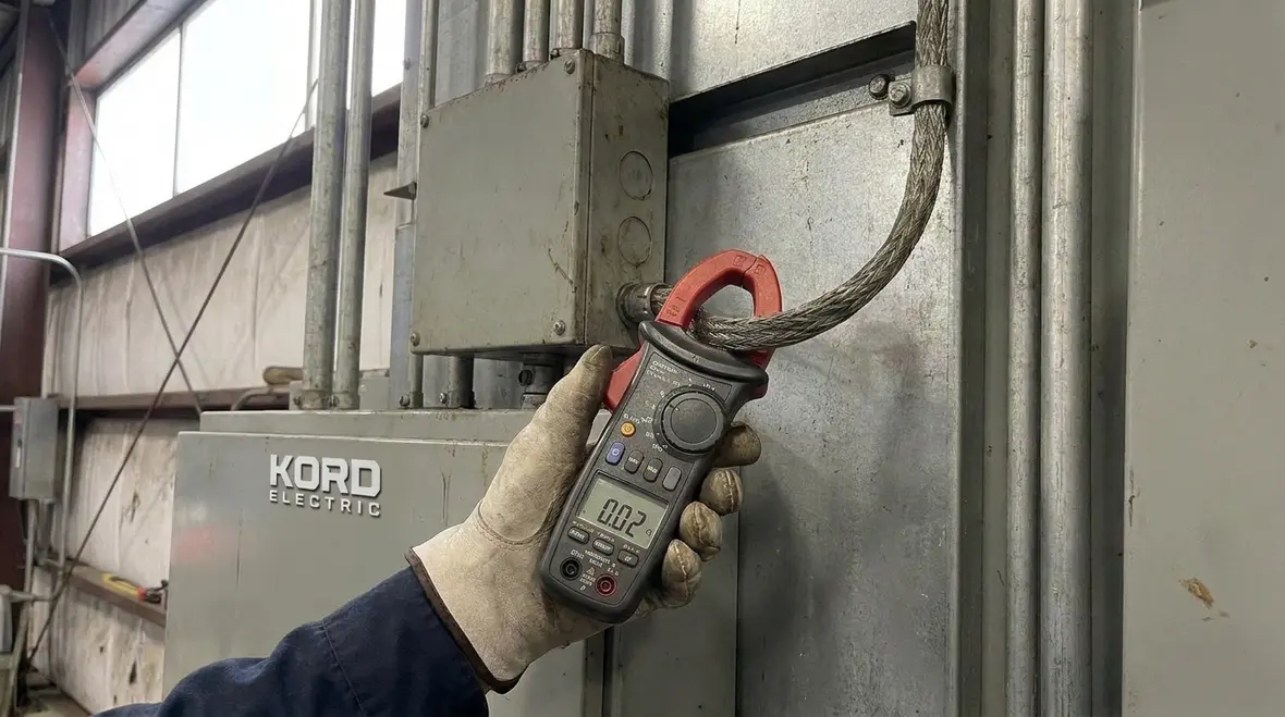 NEC AC grounding 2 kV protective devices and fault paths in a commercial facility