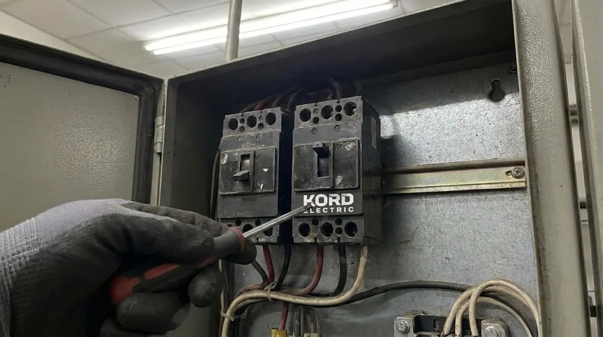 Commercial electrical distribution panel with layered NEC supplementary overcurrent protection devices