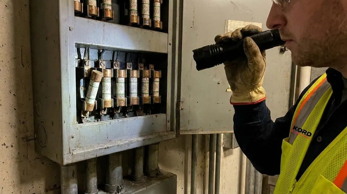 Incorrect vs correct NEC vertical fuse orientation comparison in commercial equipment