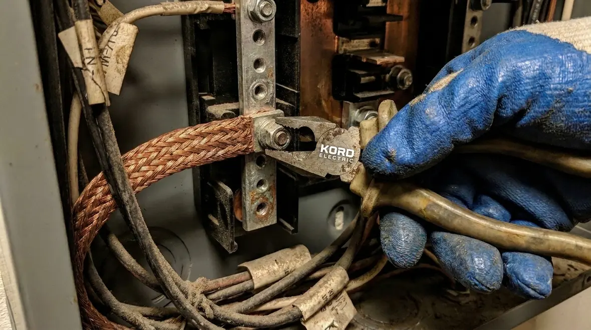 Grounding and bonding conductors organized in a commercial pool electrical room
