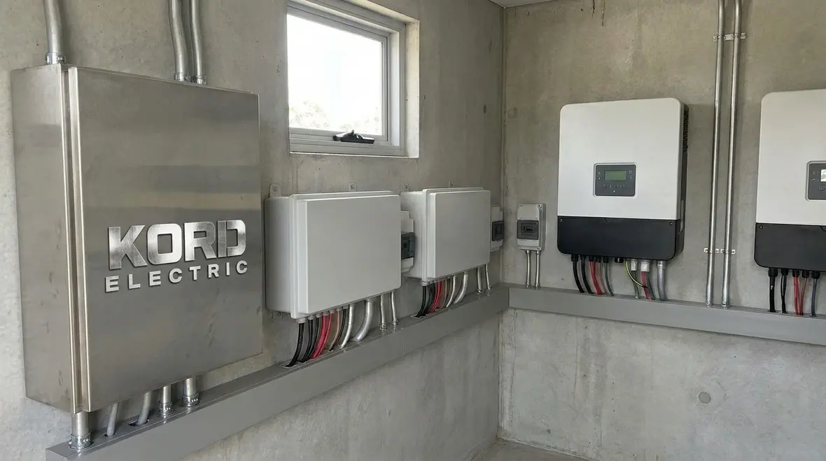 Kord Electric technicians performing field verification of PV station isolation disconnects