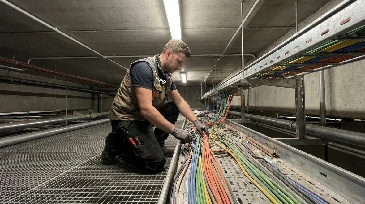 Technicians verifying NFPA 70 wind turbine construction details on site